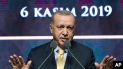 Turkish President Recep Tayyip Erdogan speaks during a meeting in Ankara, Turkey, Nov. 6, 2019. 