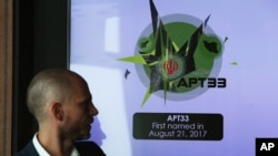 Alister Shepherd, the director of a subsidiary of the cybersecurity firm FireEye, gestures during a presentation about the APT33 hacking group, which his firm suspects are Iranian government-aligned hackers, in Dubai, United Arab Emirates, Tuesday,…