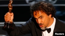 Director Alejandro Inarritu accepts the Oscar for Best Director for his film "Birdman" at the 87th Academy Awards in Hollywood, California, Feb. 22, 2015. 