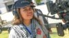 Kim Sothea Thangdy (Amy) directs the opening scene to "My Place" (Season 1), a TV reality show for PNN network. (Courtesy of PNN)