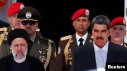El presidente de Venezuela, Nicolás Maduro, se reúne con el presidente iraní, Ebrahim Raisi, en el Palacio de Miraflores, en Caracas, Venezuela, el 12 de junio de 2023. REUTERS/Leonardo Fernandez Viloria