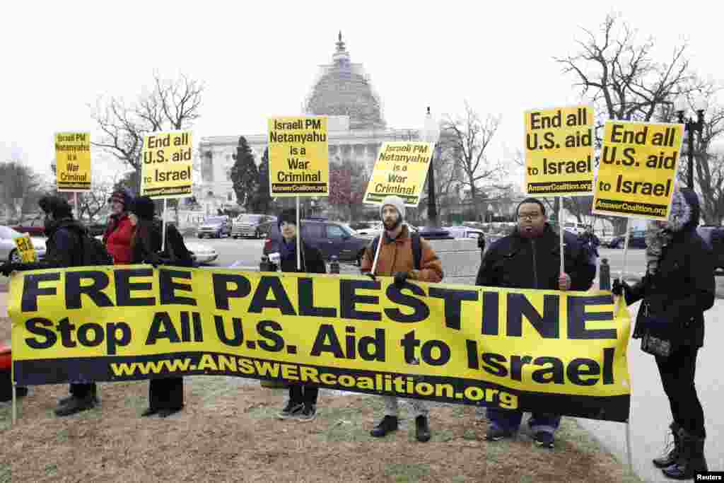 Falastinga xayrixoh faollar Vashingtonda Isroil rasmiysi Benyamin Netanyaxuning safari yuzasidan norozilik namoyishida qatnashayapti.