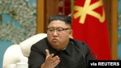 FILE - North Korean leader Kim Jong Un in Pyongyang, North Korea, in this undated photo released Nov. 16, 2020 by North Korea's Korean Central News Agency.