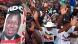 Supporters of the opposition Movement For Democratic Change (MDC) raise their hands as they cheer their leader Morgan Tsvangirai during a rally in Harare January 20, 2008.