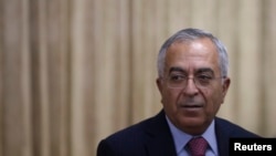 PM Palestina saat itu, Salam Fayyad, menghadiri resepsi pembukaan Konferensi Kerjasama di Antara Negara-Negara Asia Timur untuk Pembangunan Palestina (CEAPAD) (13/2/2013). Tokyo, Jepang. (foto: REUTERS/Issei Kato)