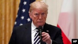 El presidente Donald Trump sostiene una conferencia de prensa con el presidente polaco, Andrzej Duda, en la Casa Blanca, el 18 de septiembre de 2018.