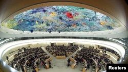 FILE - Overview of the session of the Human Rights Council during the speech of U.N. High Commissioner for Human Rights Michelle Bachelet at the United Nations in Geneva, Switzerland, Feb. 27, 2020. 