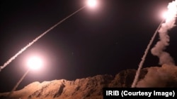 Iran’s Islamic Revolutionary Guard Corps fires missiles from the western province of Kermanshah, Oct. 1, 2018. It said the targets were militants in the eastern Syrian town of Albu Kamal. 
