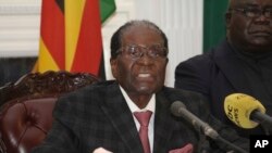 Zimbabwean President Robert Mugabe delivers a live speech to the nation, at State House, in Harare, Zimbabwe, Nov, 19, 2017. Mugabe baffled the country by ending his address without announcing his resignation.