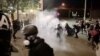 Two Portland Protests: Demonstrators March Peacefully at One, Other Declared a Riot 
