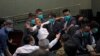 Chaos Erupts in Hong Kong Legislature Between Pro-Democracy, Pro-China Factions