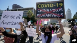 亞裔社區民眾在洛杉磯市中心進行反亞裔仇恨犯罪的抗議遊行（2021年3月27日）