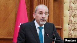 Jordan's Foreign Minister Ayman Safadi speaks during a joint press conference with Hungarian Foreign Minister Peter Szijjarto in Amman