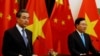 中国外长王毅与越南副总理兼外交部长范平明在河内会谈后举行新闻发布会。（2018年4月1日）