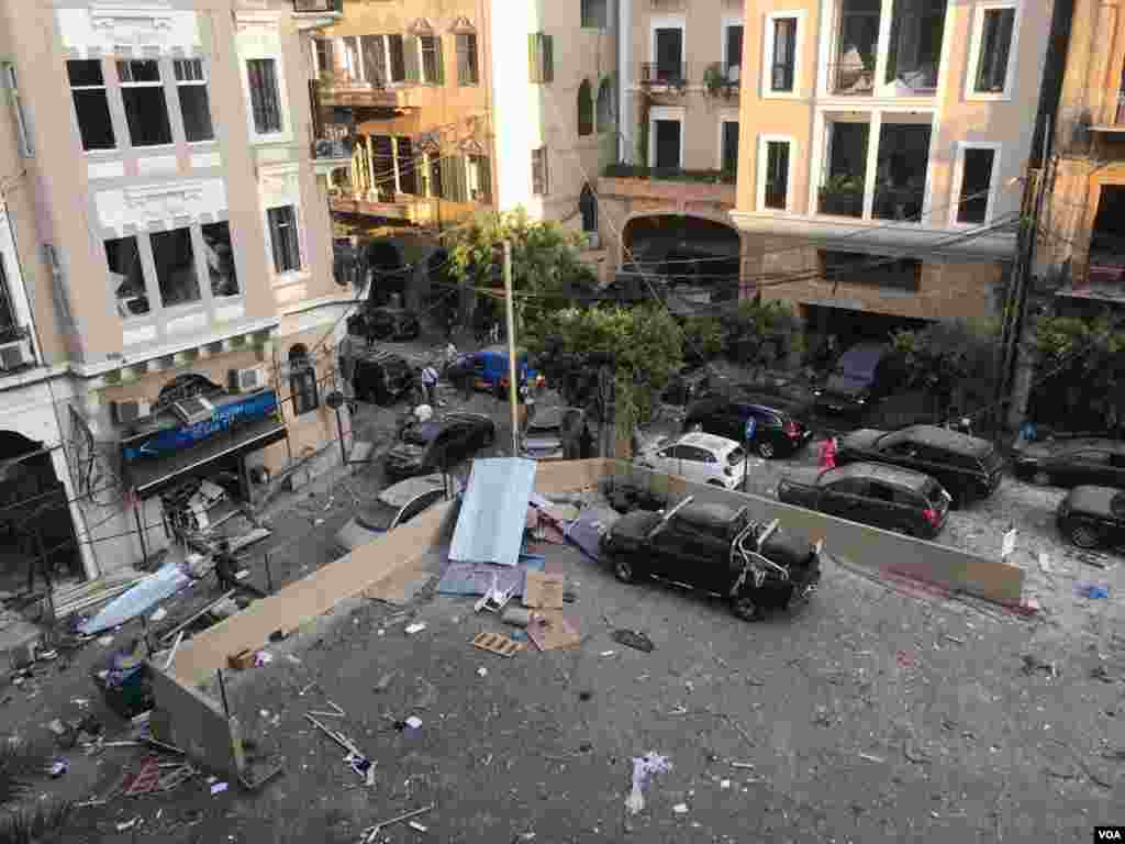 Debris from Beirut explosion is seen on the street from VOA reporter Anchal Vohra's apartment window in Beirut, Lebanon, Aug. 4, 2020. (Photo: Anchal Vohra / VOA)