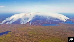 In this aerial image, wildfires burn in Shelburne County, Nova Scotia, on May 31, 2023