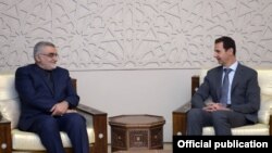 علاء‌الدین بروجردی رئیس کمیسیون امنیت ملی و سیاست خارجی مجلس ایران در دیدار با بشار اسد
