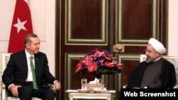 دیدار حسن روحانی رئیس جمهوری ایران (راست) و رجب طیب اردوغان نخست وزیر ترکیه در تهران - ۹ بهمن ۱۳۹۲ 