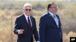 President Joe Biden and Gila River Indian Community Governor Stephen Roe Lewis are pictured at the Gila Crossing Community School, Oct. 25, 2024, in Laveen, Ariz.