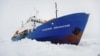 Antártica: rescate de barco por helicóptero