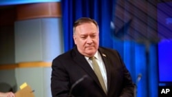 Secretary of State Mike Pompeo arrives to speak at a news conference at the State Department in Washington, Wednesday, Sept. 2, 2020. (Nicholas Kamm/Pool via AP)