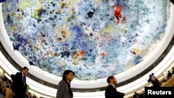U.S. Ambassador to the United Nations Nikki Haley (2L) leaves after addressing the United Nations Human Rights Council in Geneva, Switzerland, June 6, 2017.