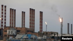 FILE - The Abadan oil refinery is seen in southwest Iran, from the Iraqi side, south of Basra, Iraq, on Sept. 21, 2019. The U.S. Treasury Department on Feb. 6, 2025, announced further sanctions on Iran's oil industry.