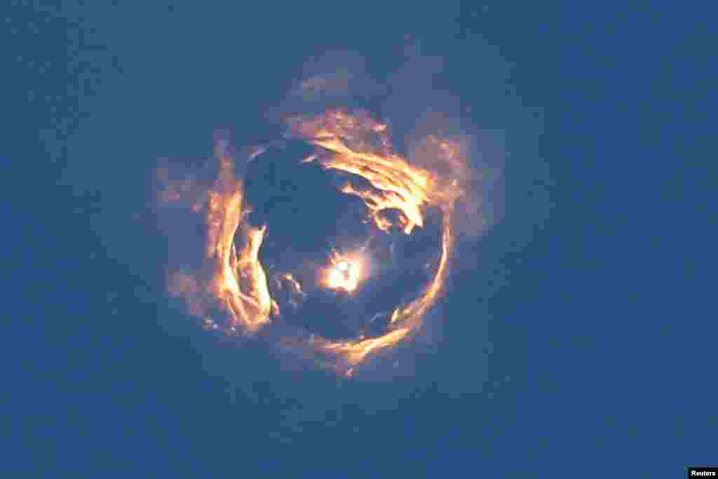 A formation is seen from SpaceX's next-generation Starship spacecraft's launch atop its Super Heavy booster on its eighth test at the company's Boca Chica launch pad in Brownsville, Texas, March 6, 2025.