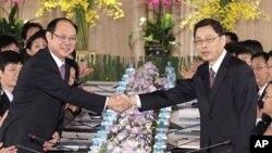 台海政治若即若离，经济互相依存。图为两岸2010年6月举行ECFA谈判时