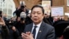 Myanmar's ambassador to the UK, Kyaw Zwar Minn speaks to the media outside the Myanmar Embassy in London, April 8, 2021.