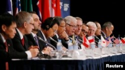 “跨太平洋伙伴關係”(TPP)協定談判國貿易代表2014年10月 27日在澳大利亞開會後召開記者會 （資料圖片）