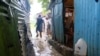 Casas de gente pobre inundadas por la tormenta tropical Franklin a lo largo del río Ozama, en el vecindario de Gualey en Santo Domingo, República Dominicana, el 23 de agosto de 2023.