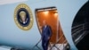 Presiden AS Joe Biden turun dari Air Force One setibanya di pangkalan udara RAF Aldergrove di County Antrim, Irlandia Utara, 11 April 2023. (REUTERS/Kevin Lamarque)