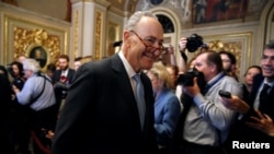 Senate Minority Leader Chuck Schumer (D-NY) walks from a Democratic caucus meeting during the third day of a shut down of the federal government in on Capitol Hill in Washington, Jan. 22, 2018. 