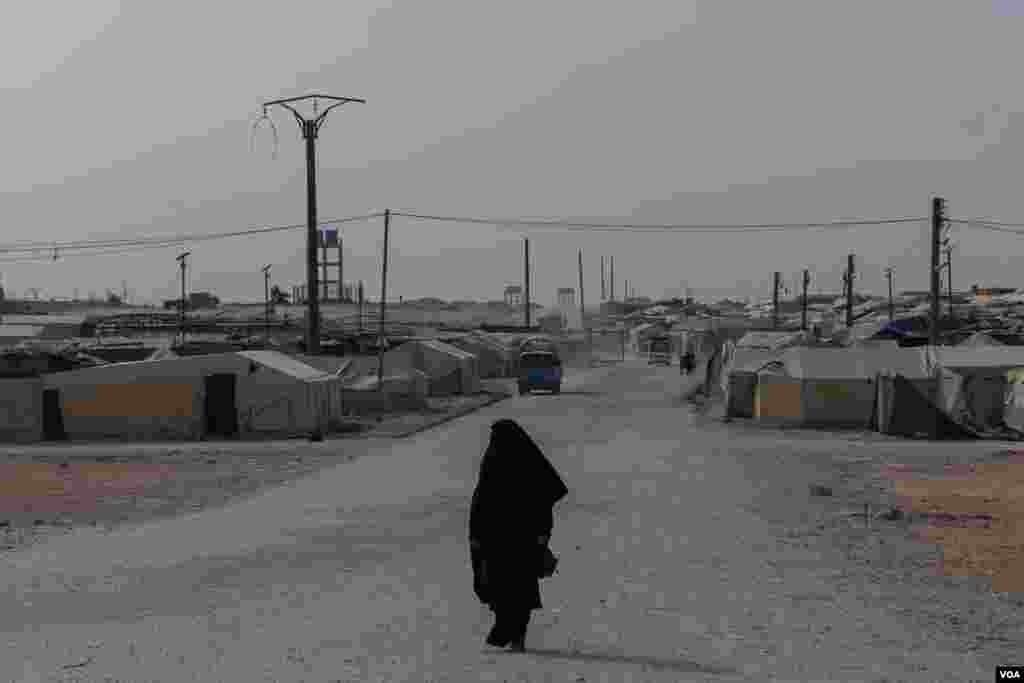 A female prisoner in al-Hol Camp, the largest prison camp in northeastern Syria, on Oct. 12, 2024. (Diego Baravelli/VOA)