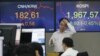 Keputusan The Fed Pertahankan Suku Bunga Undang Reaksi Beragam dari Pasar Global