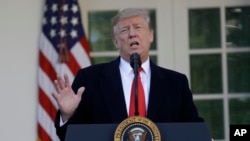 FILE - President Donald Trump speaks in the Rose Garden of the White House, Jan 25, 2019.