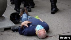 Povređeni Martin Guđino (Foto: Jamie Quinn/ via REUTERS)