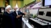Iranian President Hassan Rouhani reviews his country's new nuclear achievements during Iran's National Nuclear Technology Day, in Tehran, Iran, April 10, 2021. (Iranian Presidency Office/West Asia News Agency/Handout via Reuters) 