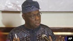 L'ancien président nigérian Olusegun Obasanjo à Harare, Zimbabwe, 2 août 2013.