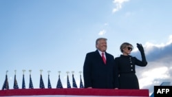 Outgoing U.S. President Donald Trump and first lady Melania Trump address guests at Joint Base Andrews in Maryland, Jan. 20, 2021.