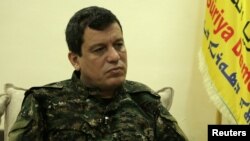 Mazloum Kobani, SDF commander in chief is pictured during an interview with Reuters in Ain Issa, Syria, Dec. 13, 2018. 