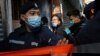 Pengacara Hong Kong Daniel Wong Kwok-tung, ditangkap pihak berwenang setibanya di kantornya di Hong Kong, 14 Januari 2021. 