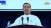 FILE - This screengrab provided via AFPTV and taken from a broadcast by Myanmar Radio and Television (MRTV) in Myanmar on April 9, 2021, shows junta spokesman Brigadier General Zaw Min Tun speaking during a live press conference.
