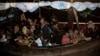 120 Rohingya Refugees Disembark From Boat in Indonesian Port 