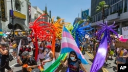 People gather in Hollywood for an 'All Black Lives Matter' march, organized by Black members of the LGBTQ+ community in the Hollywood section of Los Angeles on June 14, 2020.