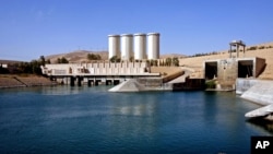 FILE - A general view of the dam in Mosul, 360 kilometers (225 miles) northwest of Baghdad, Iraq. In late February, the U.S. Embassy in Baghdad called the dam's risk of collapse "serious and unprecedented."
