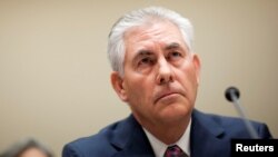  Rex Tillerson, chairman and CEO of ExxonMobil, testifies about the company's acquisition of XTO Energy before the House Energy and Environment Subcommittee on Capitol Hill in Washington, Jan. 20, 2010.