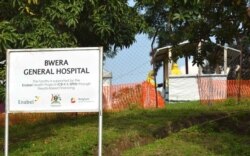 Health workers dressed in Ebola protective suits are seen readying an Ebola preparedness facility at the Bwera general hospital near the border with the Democratic Republic of Congo in Bwera, Uganda, June 12, 2019.