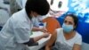 Health Officials Watch for Side Effects from COVID-19 Vaccine